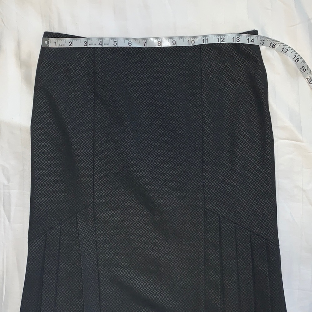 BeBe Skirt, Size 2. Good used condition. Pleaded on the sides. Runs big - Picture 3 of 6